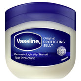 A 50ml container of Vaseline Petroleum Jelly with a blue lid and "Dermatologically Tested Skin Protectant" label.